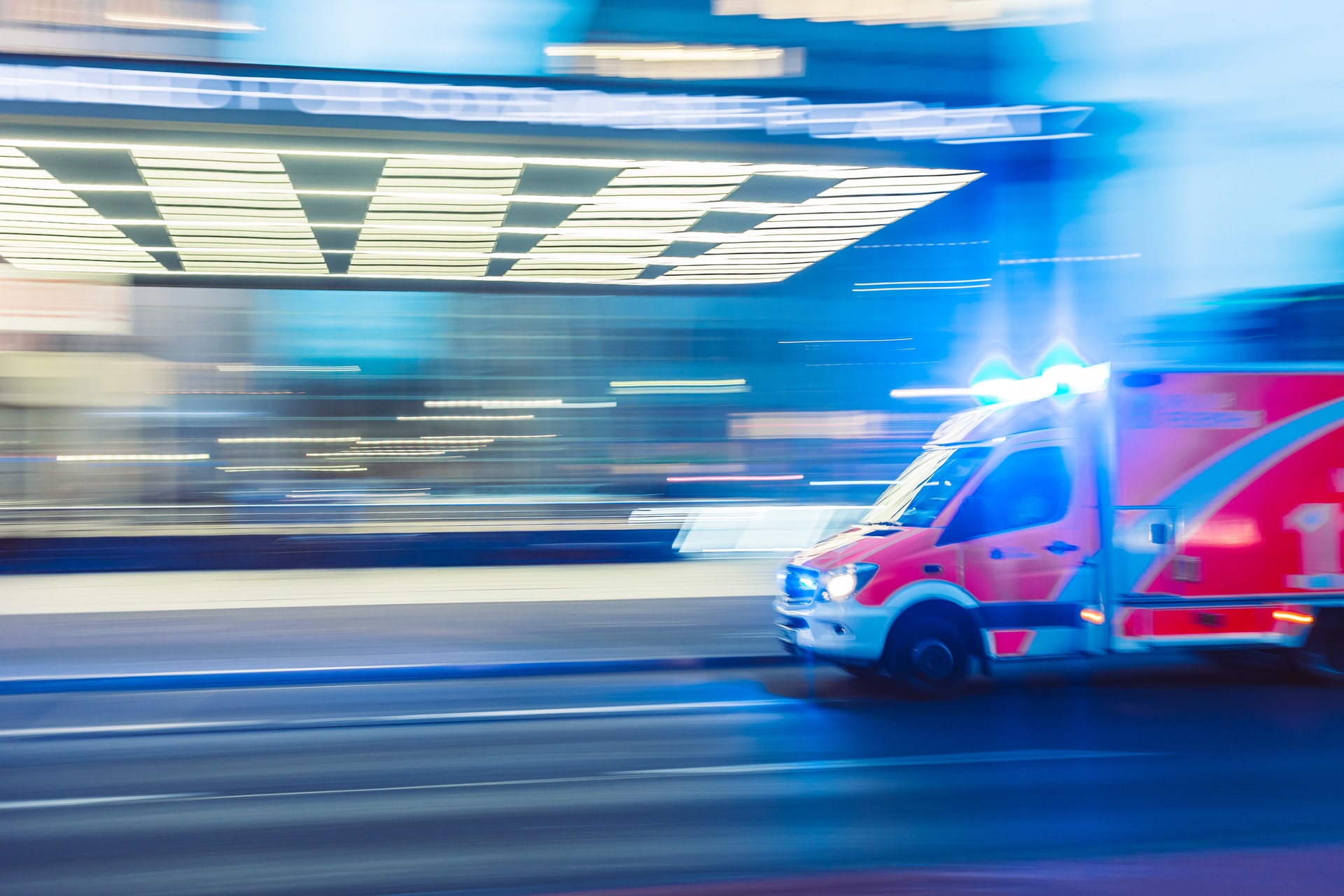 An ambulance pulling up to an emergency room representing various medical errors patients can face while being treated in a hospital